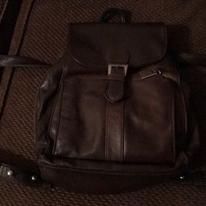 BLOOMINGDALES. Brown leather backpack pocketbook.